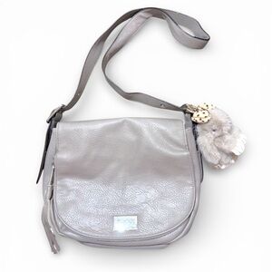 Juicy Couture Rosa vegan leather saddle bag/Crossbody adjustable strap10”x11”